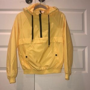 Yellow windbreaker jacket